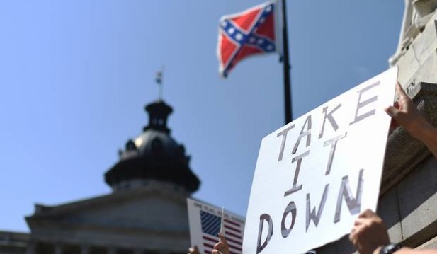 Protesters call for Confederate Flag to be removed.