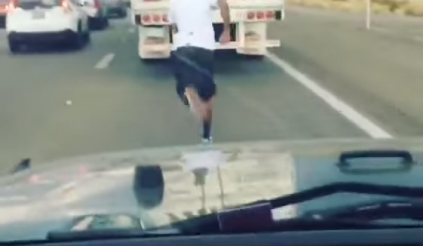 Man Running To Remove Confederate Flag From Truck