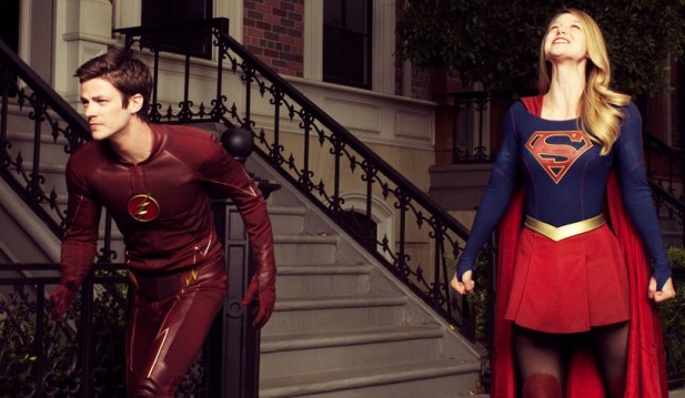 Grant Gustin as The Flash and Melissa Benoist as Supergirl