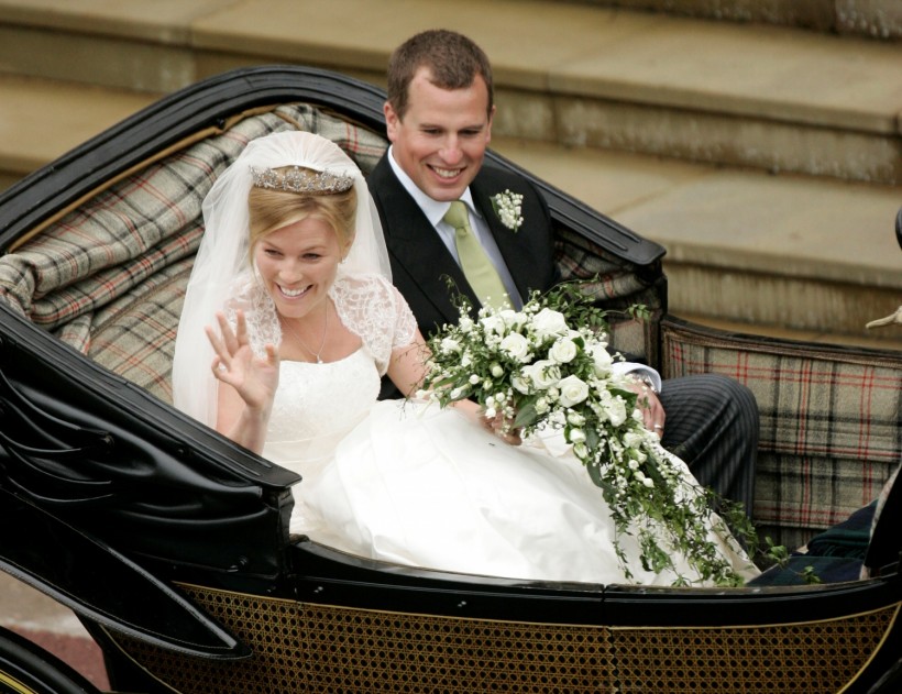 All smiles as Peter Phillips and wife, Autumn leave St. George's Chapel after wedding ceremony.