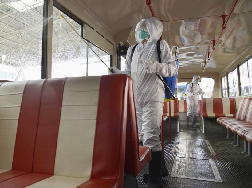 A trolley bus is disinfected amid fears over the spread of the novel coronavirus in Pyongyang