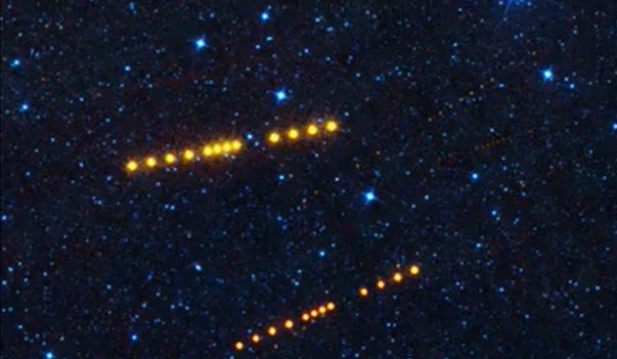 NASA Spots Strings of Bright Orange Dots Depicting Two Giant Asteroid 