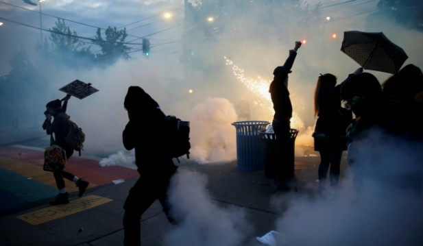 Police use tear gas to control nation-wide protests and may spread the coronavirus