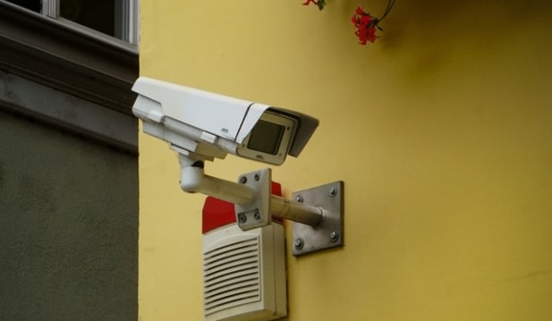 How to Secure your Home: an Alarm, a Camera or Both?