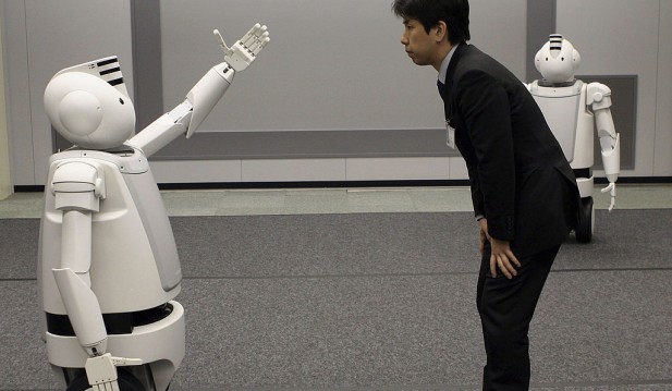 Japanese Electronics Conglomerate Hitachis New Humaniod Robot 'Emiew'