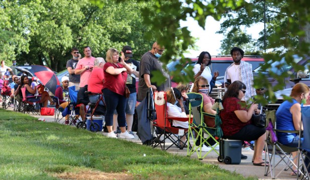 People Wait In Line To File For Unemployment Benefits In Frankfort, Kentucky
