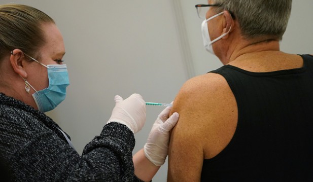 Vaccine Centers Begin Covid Inoculations In Some States