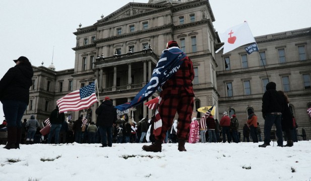 Pro-Trump Protesters Gather At State Capitols Across The Nation On Day Of Electoral College Ratification