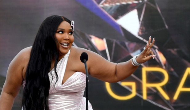 Lizzo Sends Flirty Drunk DM to Chris Evans. How Do You Think He Responded?