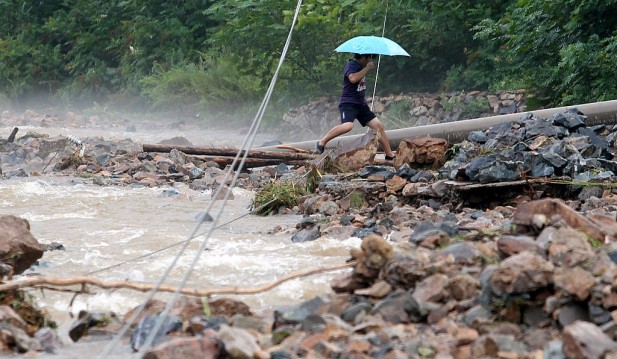 North Korea Floods Prompt Thousands to Evacuate; Heavy Rains Damage Home, Roads Amid Worsening Food Shortage