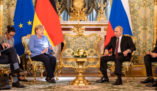 German Chancellor Angela Merkel meets with Russian President Vladimir Putin at the Kremlin.