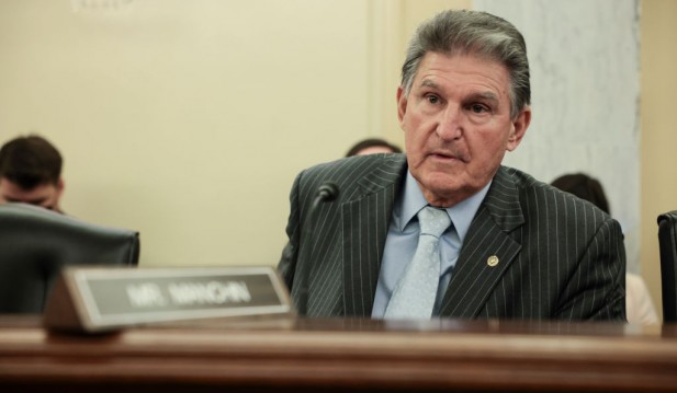 Joe Manchin Raises Fist to Bernie Sanders During Spending Negotiations, Says He Is Offered to Leave the Democratic Party