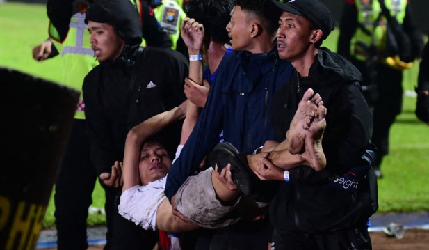 Indonesia Football Game Stampede Kills Over 120 People as Police Try To Curb Rioting Fans