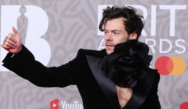 Harry Styles Concert Leaves Cardiff With 'Feather Boa Massacre' Everywhere