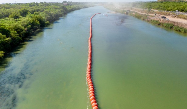 Texas Deploys Buoys Into Rio Grande River To Deter Migrants