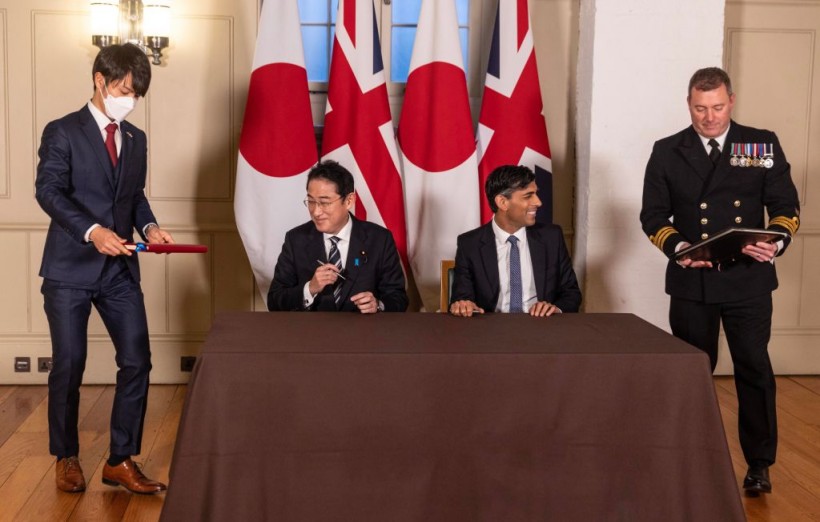 The Prime Minister Of Japan Signs A Defence Agreement With The UK