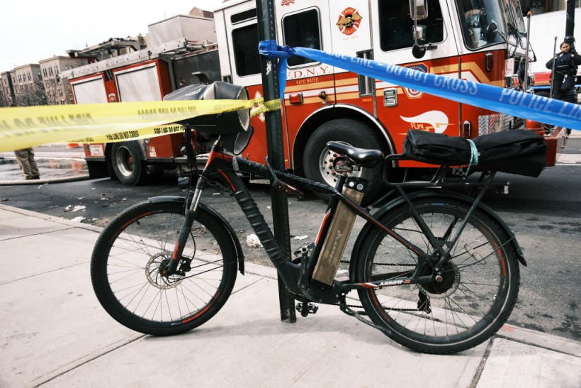 NYC Officials Blame E-Bike Battery for Fatal Fire Incident; Stricter Regulations Now Being Called