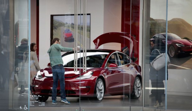 Cheapest Tesla's US Federal Tax Credit Will Be Halved in 2024—Here's What Model 3 EV Buyers Should Do