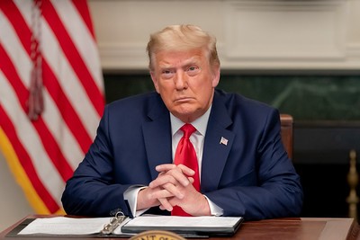 President Donald J. Trump speaks with armed services personnel Thursday, Nov. 26, 2020, during a Thanksgiving video teleconference call from the Diplomatic Reception Room of the White House. 