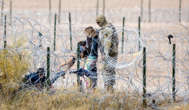 Migrants Continue To Cross Mexico U.S. Border As Lawmakers Continue To Debate Border Funding
