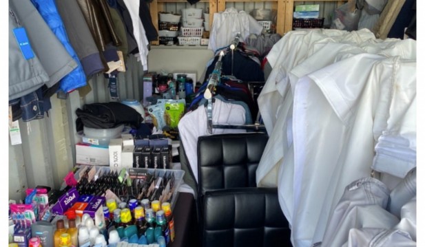 Bins of cosmetics, personal care items and other allegedly stolen goods seized by authorities