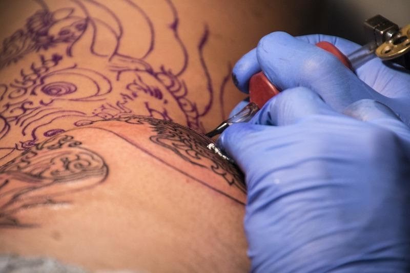 How a Custom Tattoo Machine Will Up Your Tattoo Game