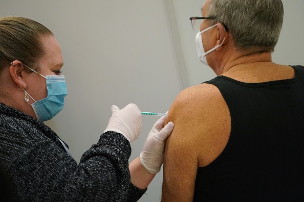 Vaccine Centers Begin Covid Inoculations In Some States