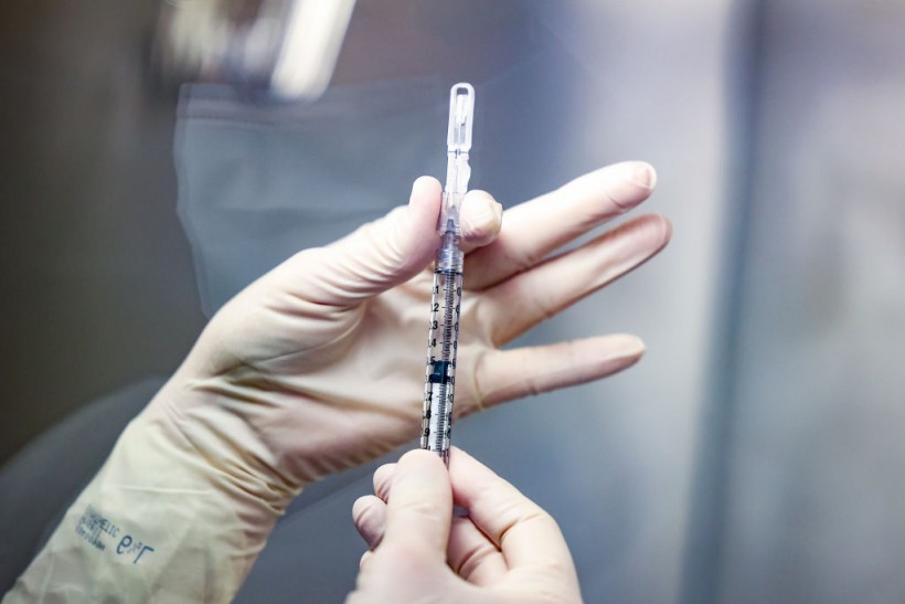 One-Third of COVID-19 Vaccine Skeptics Agree to Be Inoculated If Offered $100
