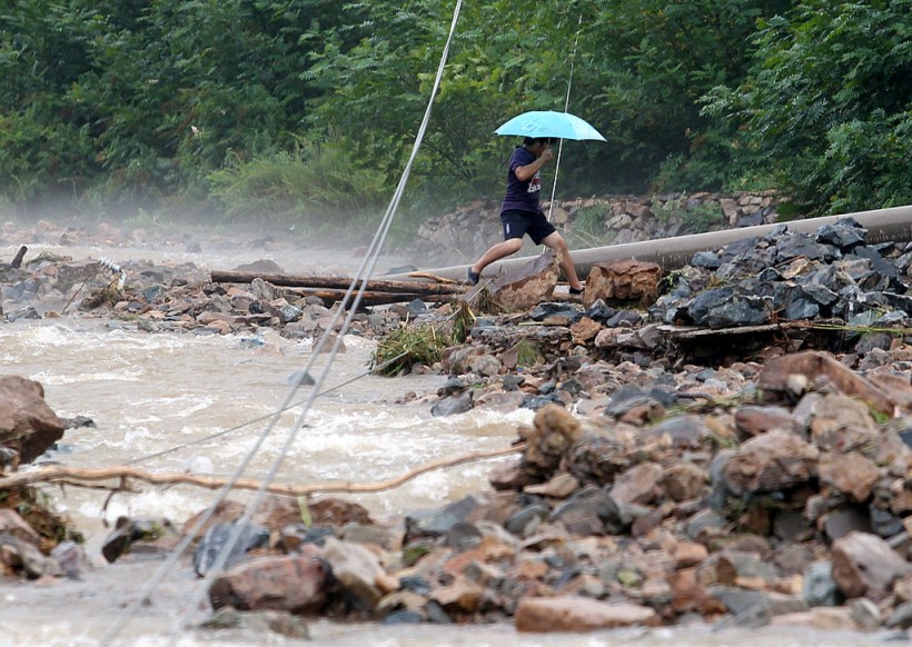 North Korea Floods Prompt Thousands to Evacuate; Heavy Rains Damage Home, Roads Amid Worsening Food Shortage