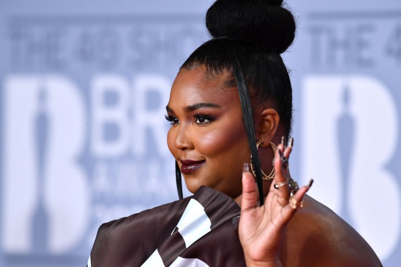 Watch: Lizzo Fakes Pregnant Belly After Fan Art Shows What Her and Chris Evans' Baby Would Look Like