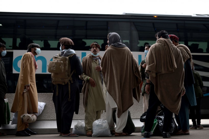 Afghan Refugees Arrive At Dulles Airport After US Pulls Out Final Troops