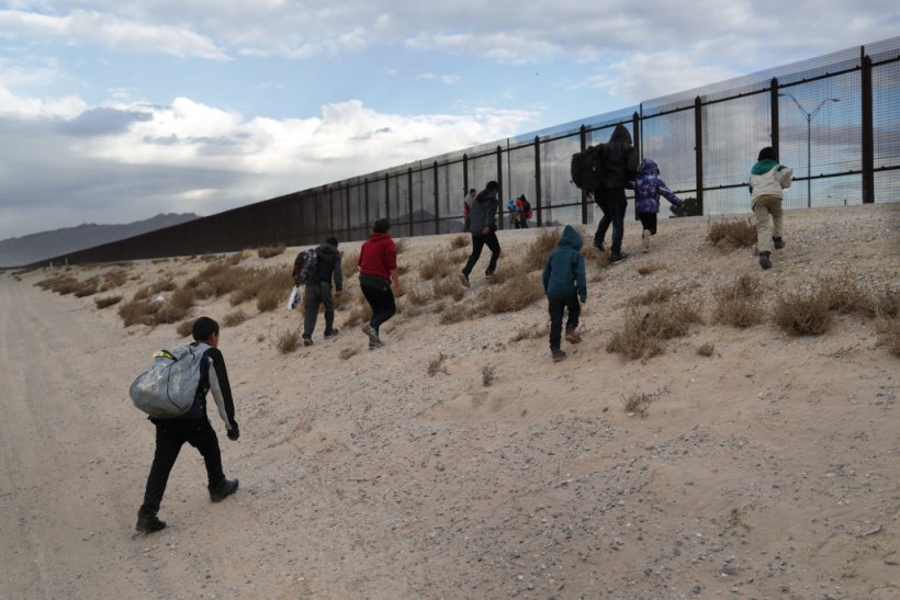 Southern Border Crisis: Illegal Immigrants Dress in Camouflage, Climb in Naco Wall To Run Into US Soil