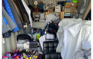 Bins of cosmetics, personal care items and other allegedly stolen goods seized by authorities